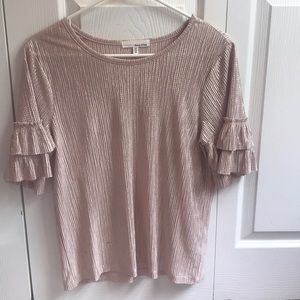 Shimmery pink top with ruffled sleeves